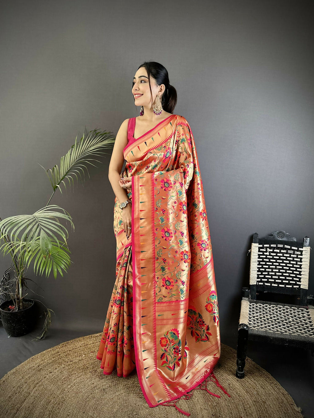 Rani Pink soft silk Paithani saree with elegant floral vine patterns