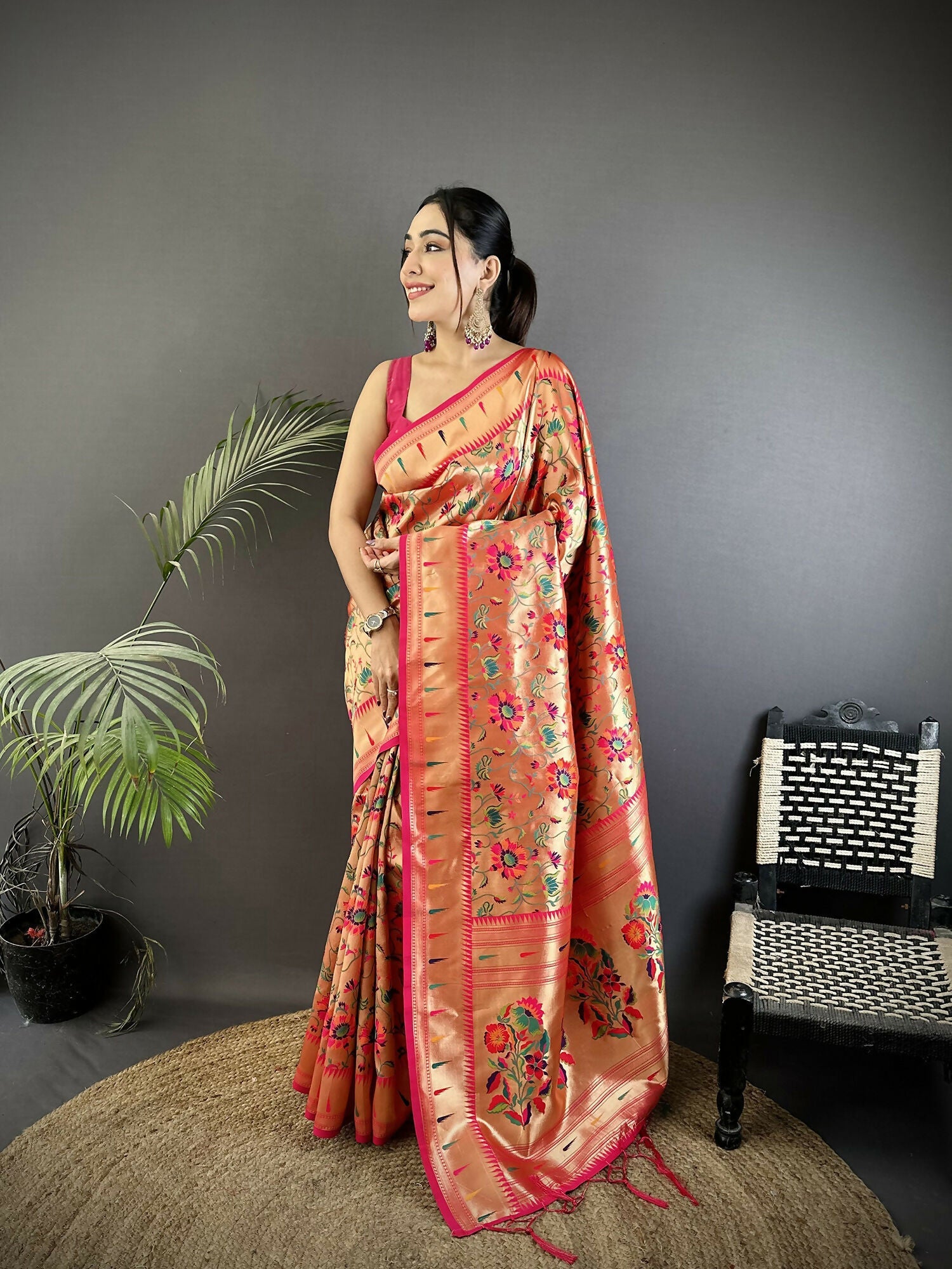 Rani Pink soft silk Paithani saree with elegant floral vine patterns