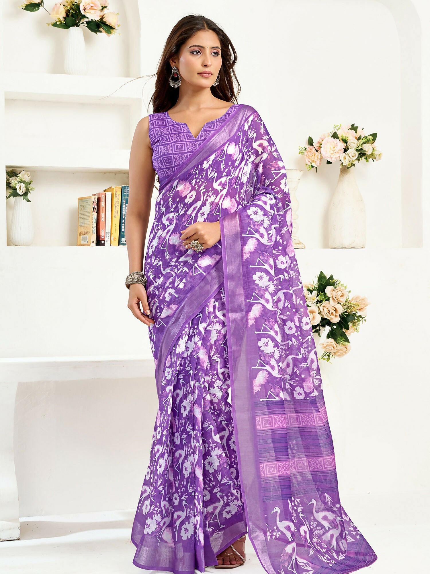 Purple linen ready-to-wear saree with bird and floral motifs and matching unstitched blouse.