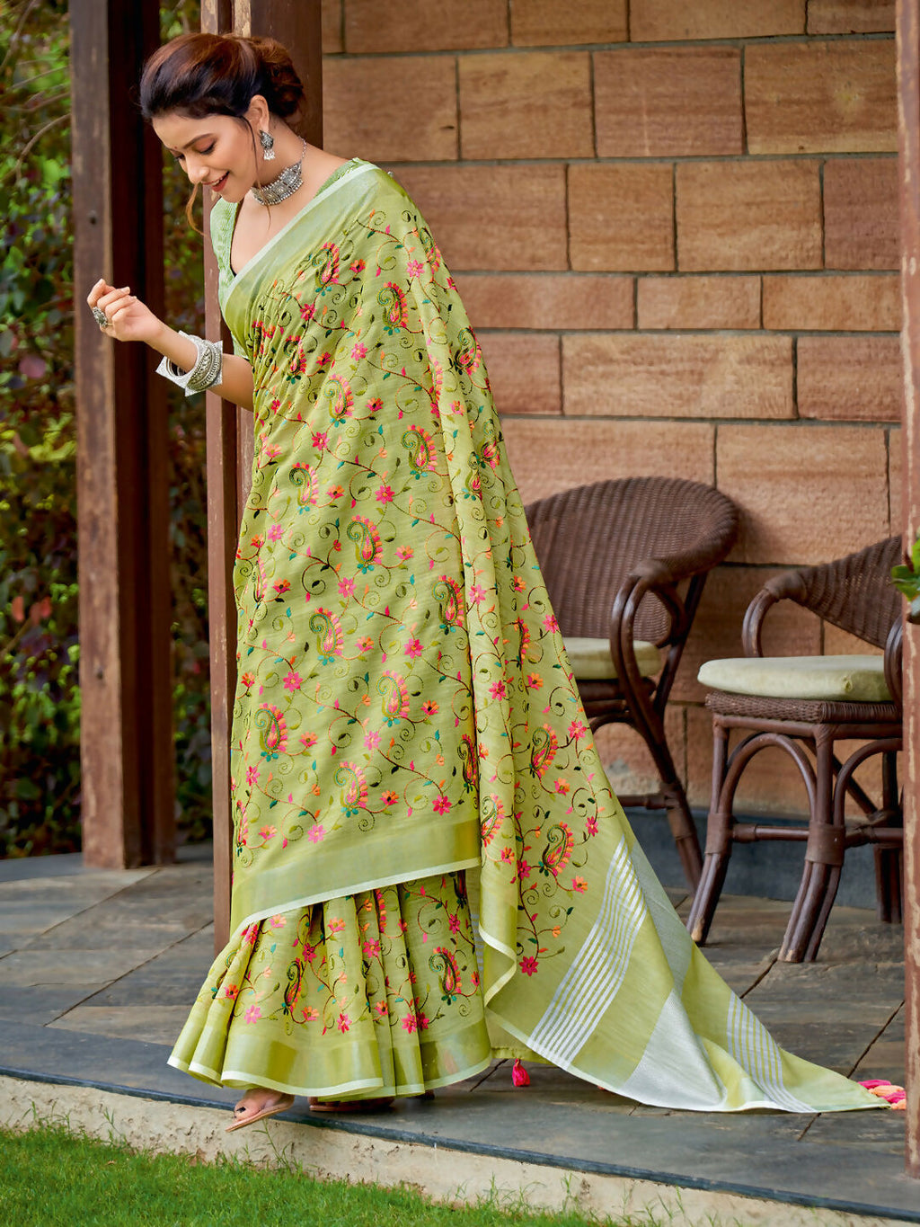 Yellow Green linen saree with matching blouse piece displayed elegantly