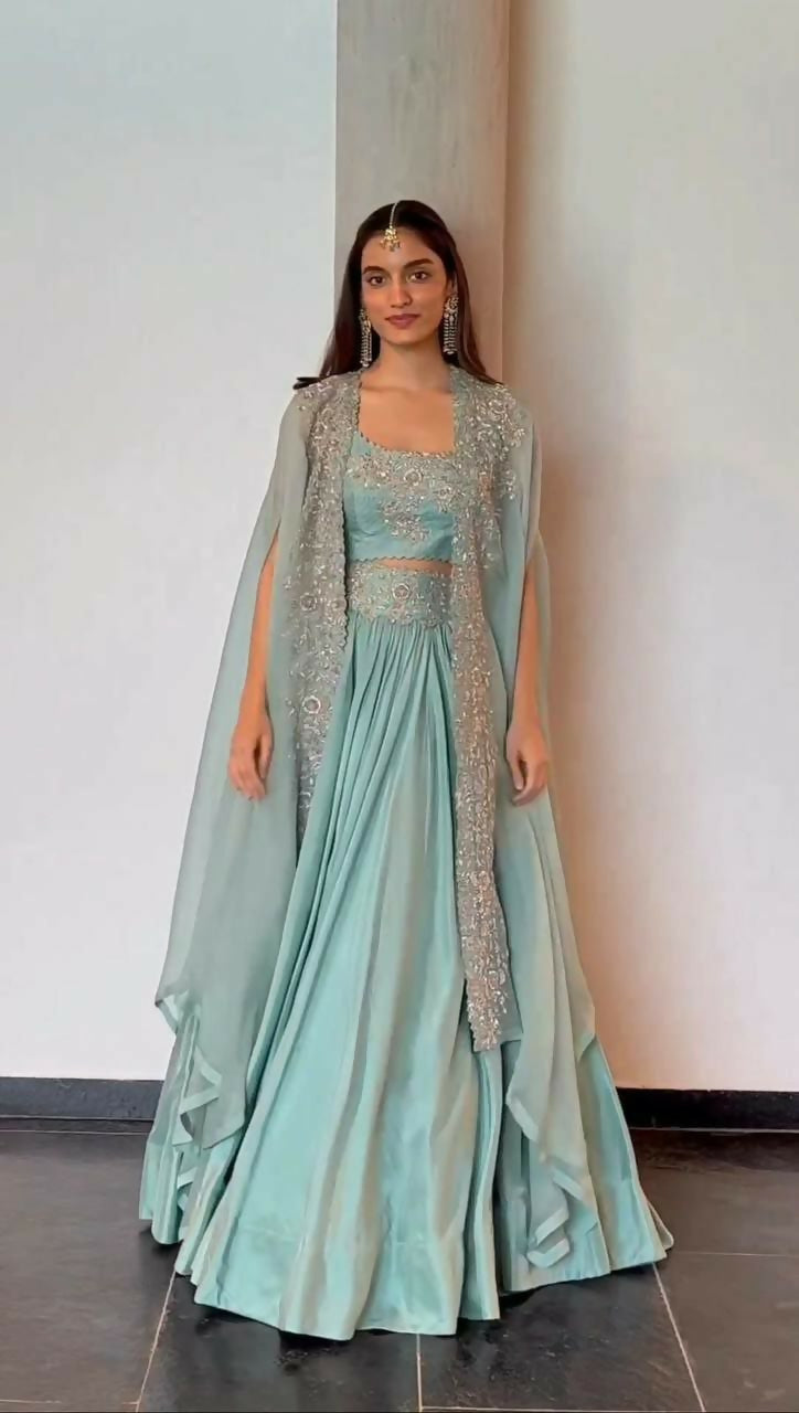 Sky blue Chinon lehenga choli set with sequins, thread embroidery and matching shrug