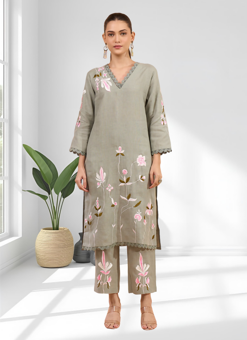 Pista Green linen kurta featuring delicate embroidery and V-neck paired with matching pants.
