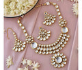 Handcrafted Kundan stone studded gold plated necklace and earring set