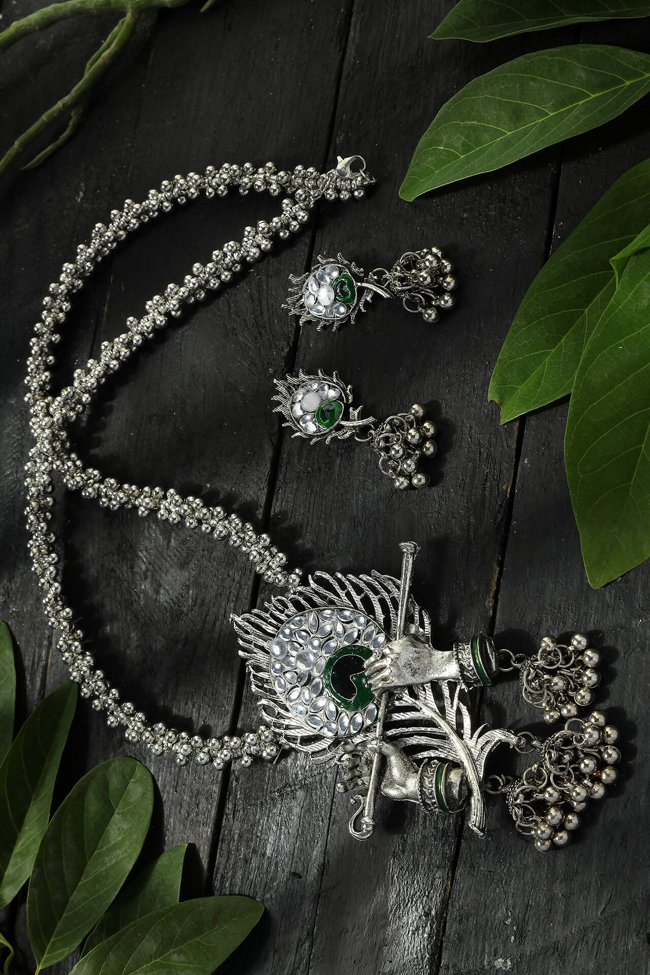 Oxidised silver-plated long necklace with Bansuri motif on a brass base