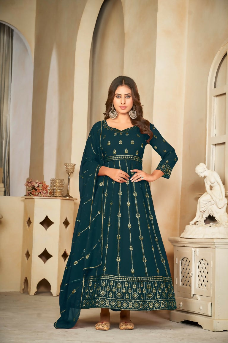 Woman wearing a floor-length Rama Green embroidered Anarkali kurta set with dupatta