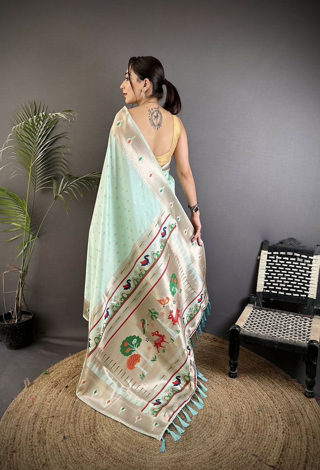 Sea Green Peacock and Floral Motif Lichi Silk Kanchipuram Saree
