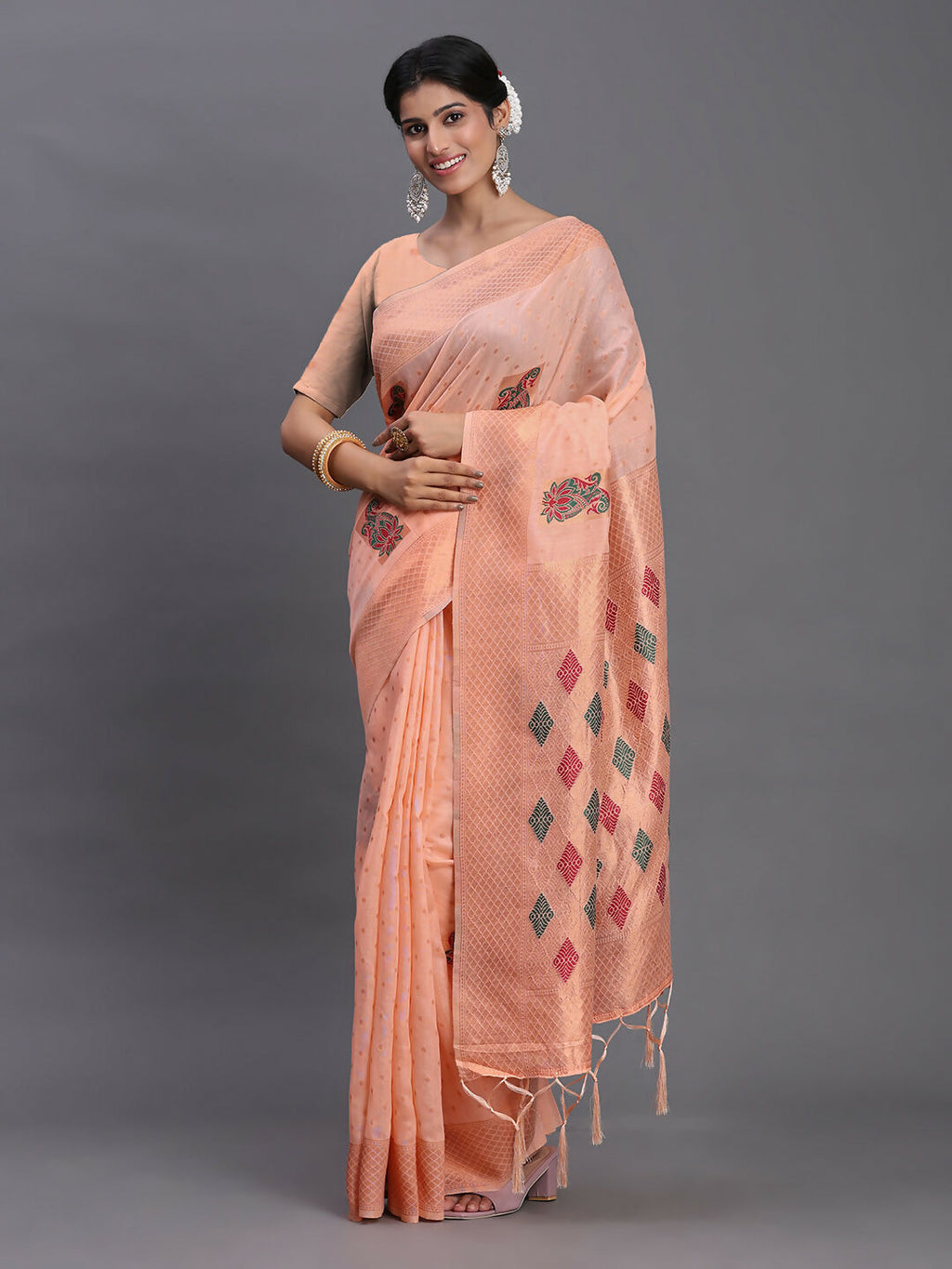 Peach Linen Cotton saree paired with matching blouse fabric