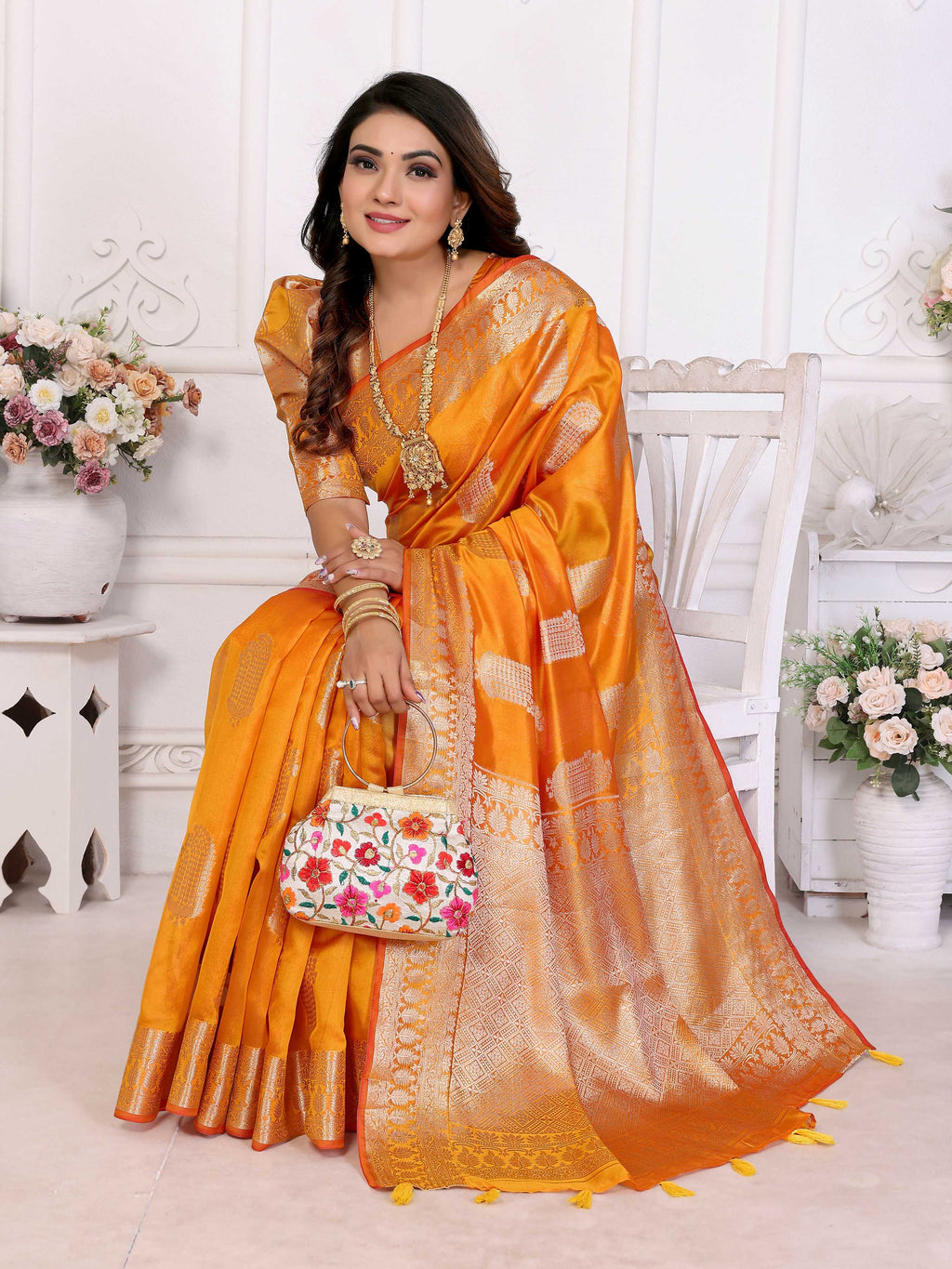 Yellow Soft Organza Silk Saree with Elegant Weaving Patterns