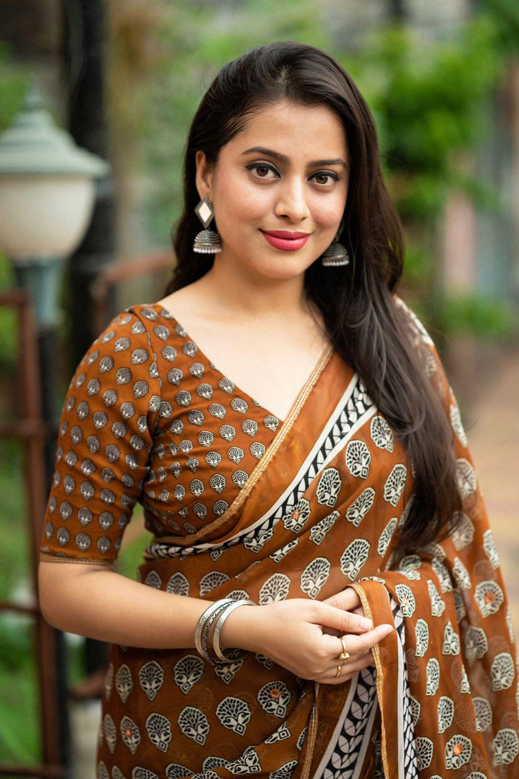 Mustard Poly Georgette Ajrak Saree with Mirror Work