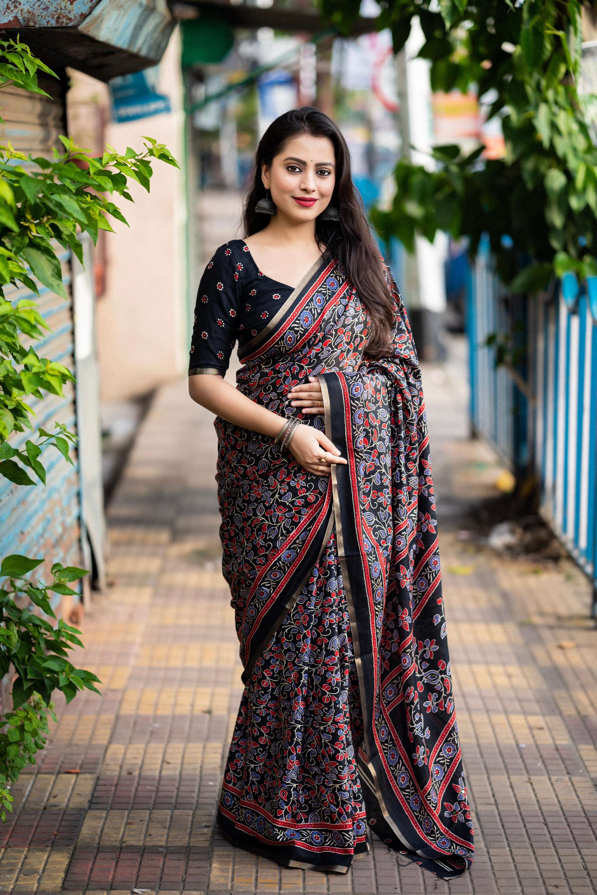Black cotton blend Ajrak saree with zari woven border