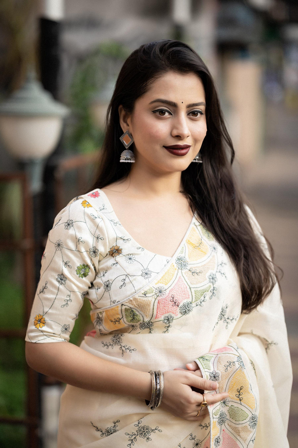 Cream Pure Linen Saree with Ethnic Motifs and Embroidered Blouse