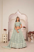Turquoise Green Butterfly Net Lehenga with intricate zari and sandwich sequence embroidery