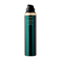 Oribe Curl Shaping Mousse in a luxury emerald green and black canister with gold accents.