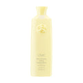 Oribe Hair Alchemy Fortifying Treatment Serum in pale-yellow packaging.