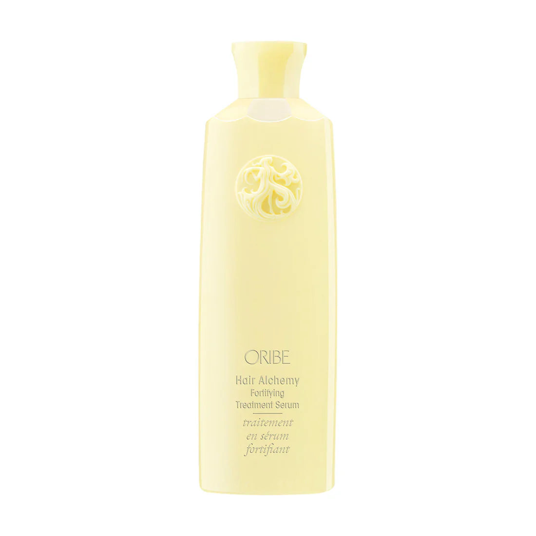 Oribe Hair Alchemy Fortifying Treatment Serum in pale-yellow packaging.