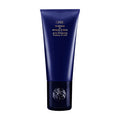 Navy-blue and gold 33.8 fl. oz bottle of Oribe Conditioner for Brilliance & Shine