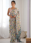 Off white Chinon silk designer saree with detailed print and mirror work border.