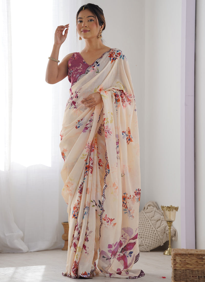Cream Chinon Silk saree with intricate print work and mirror-work lace border