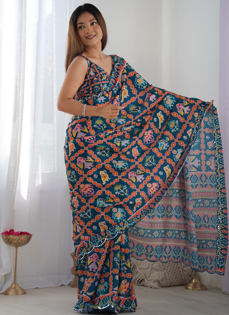 Blue Chinon Silk designer saree with intricate mirror work border and elegant print pattern