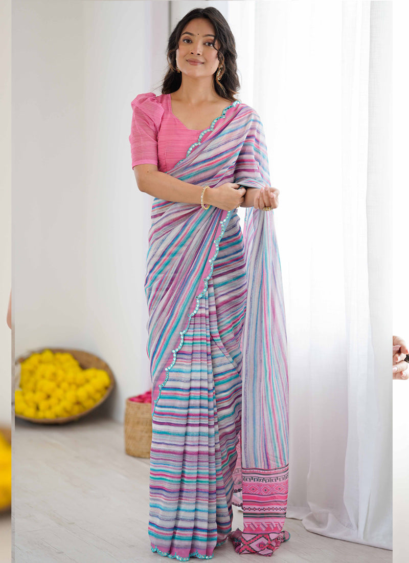 Multi-color striped georgette saree with intricate mirror work border in pink, purple, teal, and white.