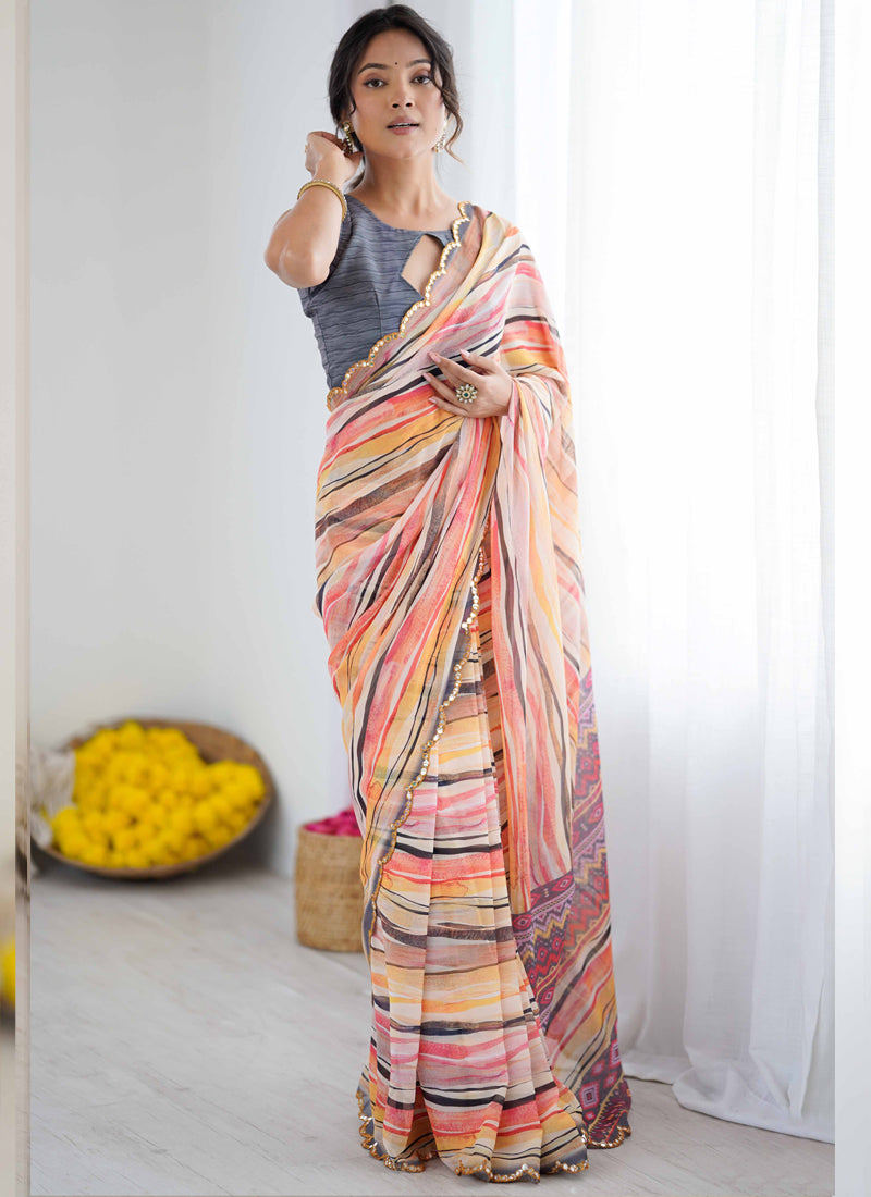Multi-color printed chiffon saree with detailed mirror work border