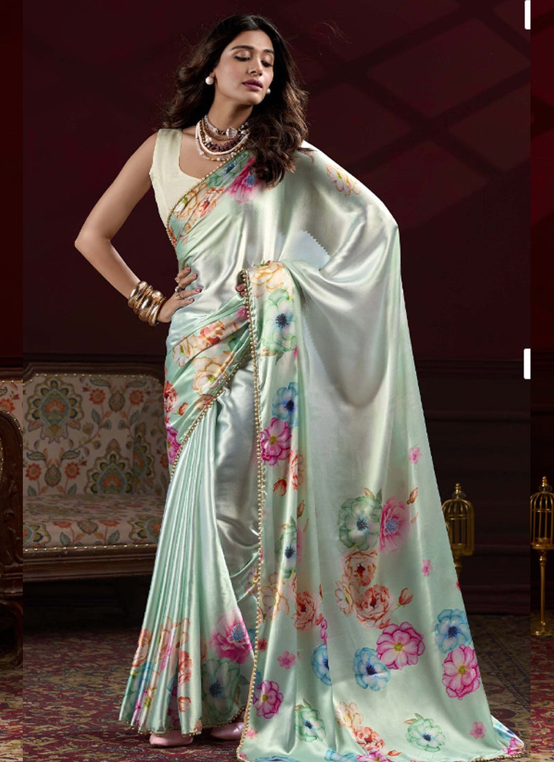 Light Green Satin Silk saree with digital floral prints and a pearl lace border