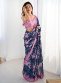 Beautiful blue Chinon silk designer saree with a detailed mirror work border.