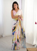 Elegant off-white and sky blue Chinon silk saree for girls with intricate mirror work border and included blouse