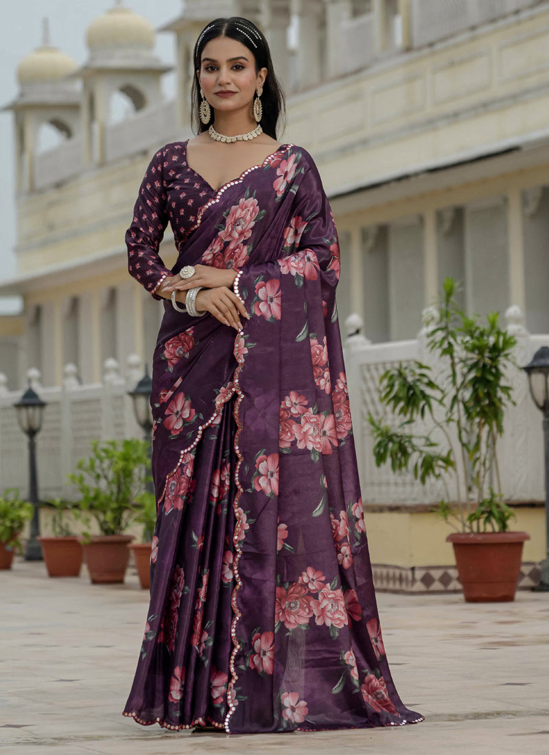A wine-colored ready-to-wear Chinon silk saree featuring floral prints and a decorative mirror-work border.