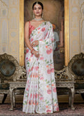 Off white floral printed Chinon silk saree with mirror cut border