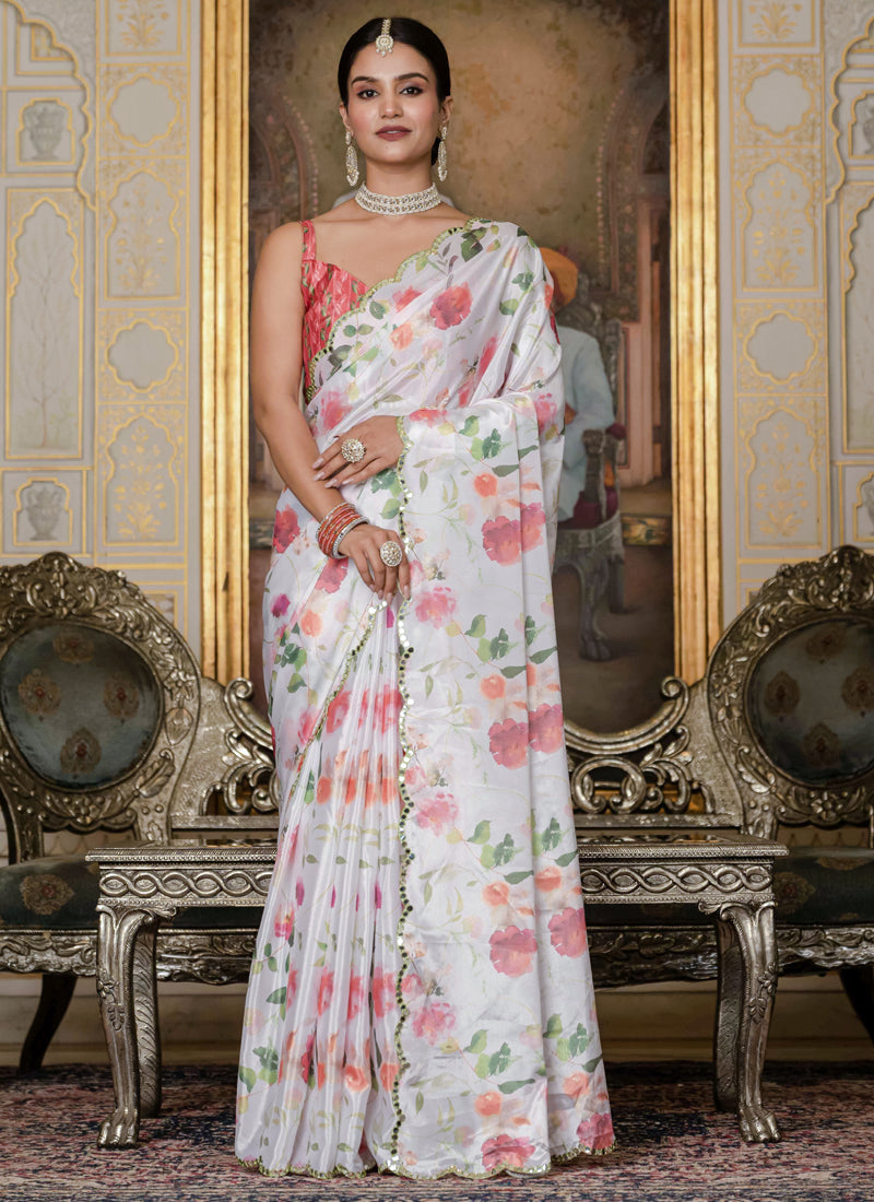 Off white floral printed Chinon silk saree with mirror cut border