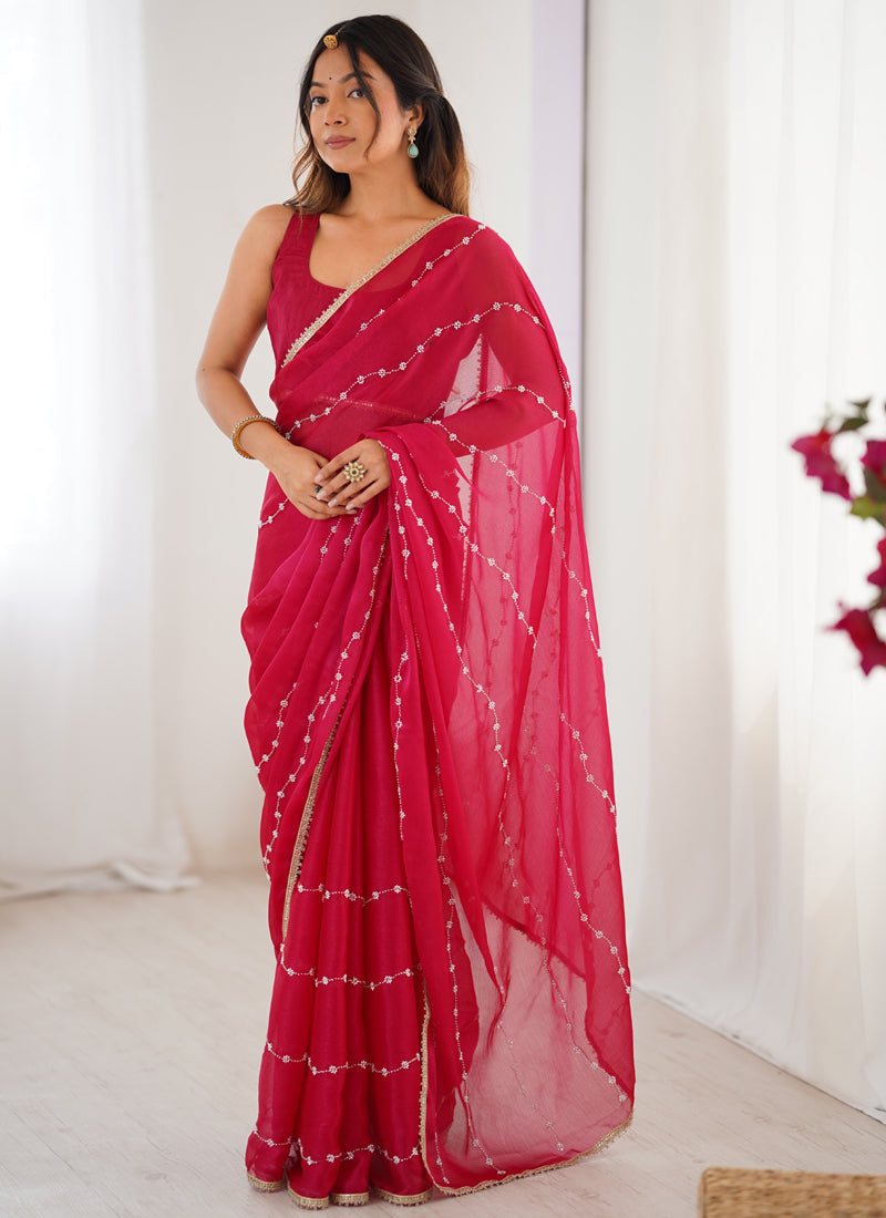 Pink smooth Sitara fabric designer saree with Moti and Val sequence and heavy lace border.