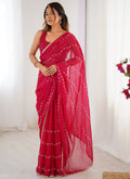 Pink smooth Sitara fabric designer saree with Moti and Val sequence and heavy lace border.