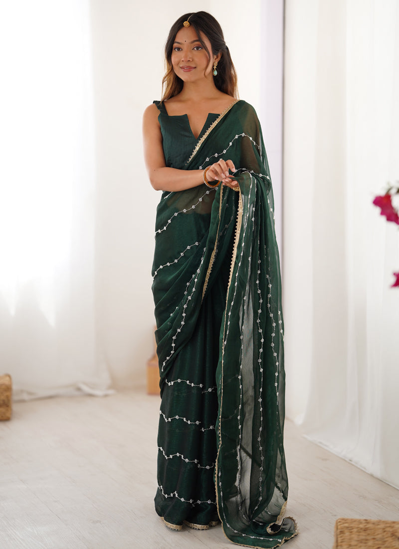 Green smooth Sitara fabric designer saree with heavy Moti and Val sequence lace border