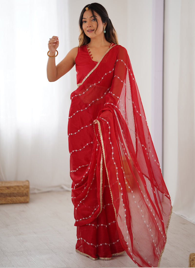 Red Art Silk designer saree featuring Moti and Val sequence work with heavy lace border