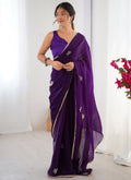 Violet Fandy Silk designer saree with heavy lace border, Moti and Val sequence detailing.