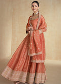 Elegant orange Anarkali suit made from premium viscose jacquard with embroidery.