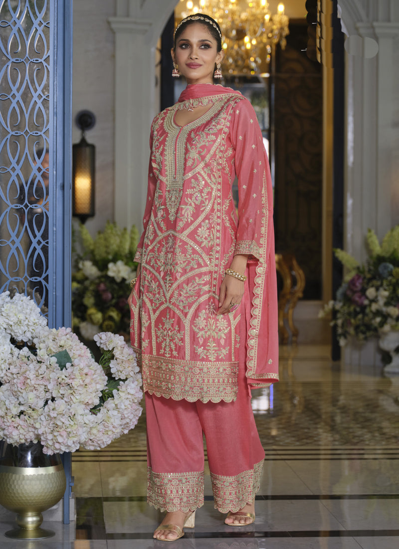 Peach Chinon Silk palazzo suit adorned with shimmering embroidery and gota patti.