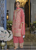 Peach Chinon Silk palazzo suit adorned with shimmering embroidery and gota patti.