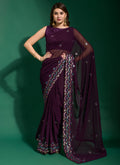 Purple georgette saree with intricate embroidery and blouse