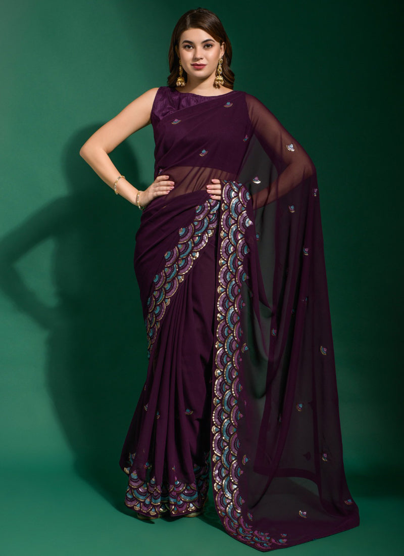 Purple georgette saree with intricate embroidery and blouse