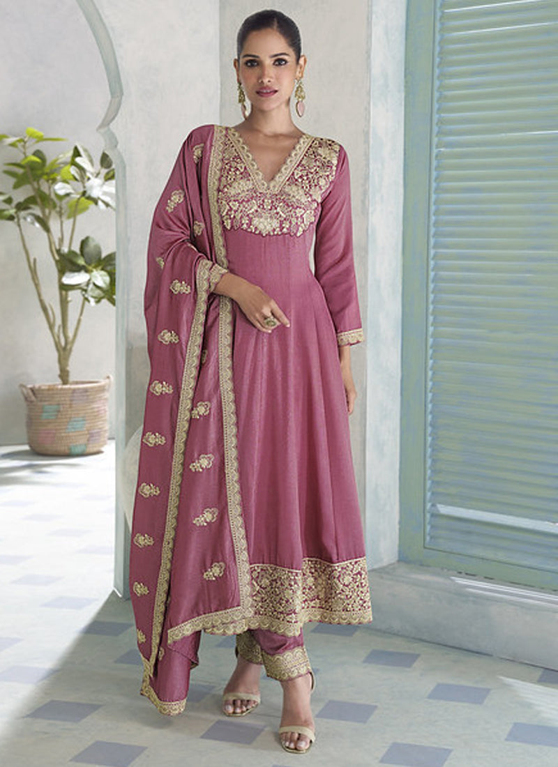 Onion pink Art Silk Anarkali suit with sequence embroidery and included bottom and dupatta.