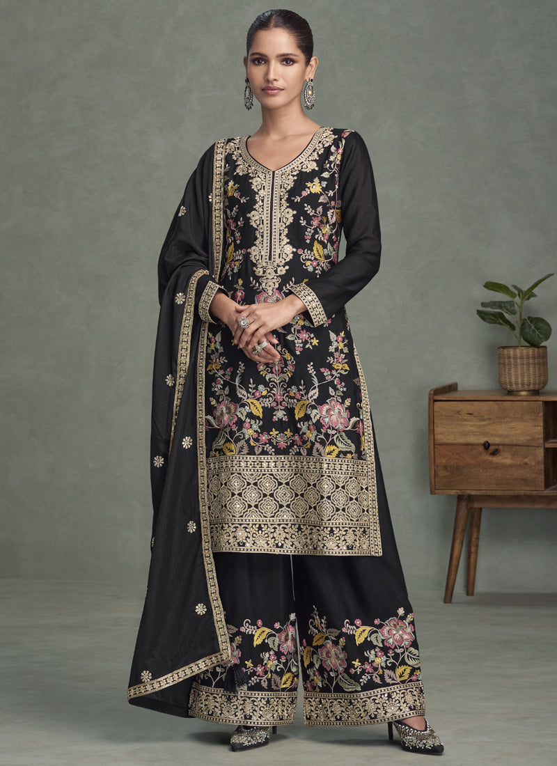 Elegant black chinon silk palazzo suit with intricate gold embroidery and gota patti work