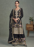 Elegant black chinon silk palazzo suit with intricate gold embroidery and gota patti work