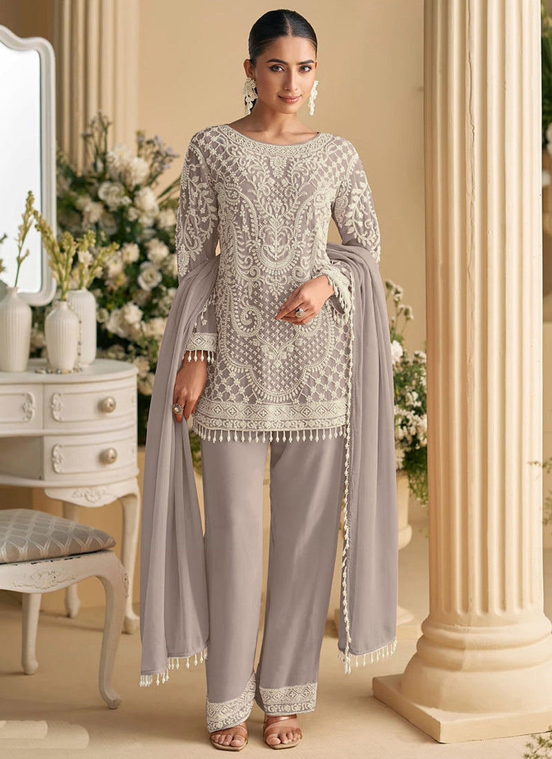 Light Brown Georgette salwar suit with intricate beadwork and traditional embroidery
