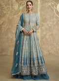 Sky blue lehenga style suit with intricate embroidery and gota patti detailing.