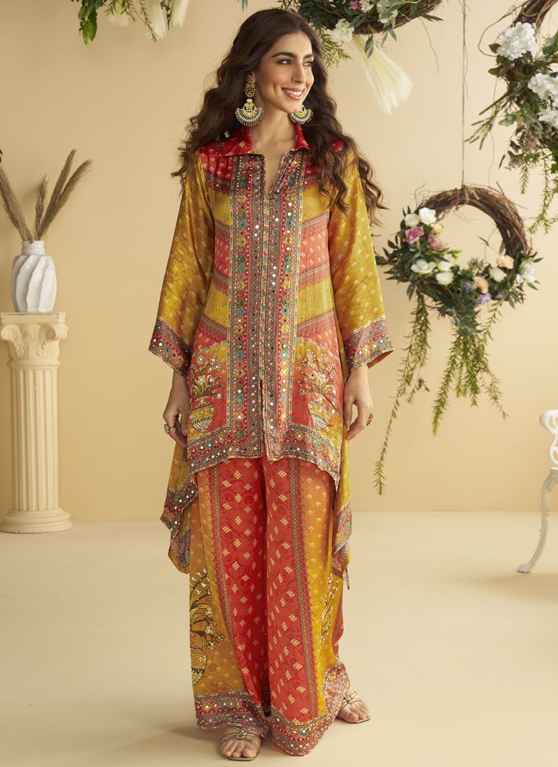 Yellow crepe silk designer cord set with detailed mirror work and gota patti embroidery