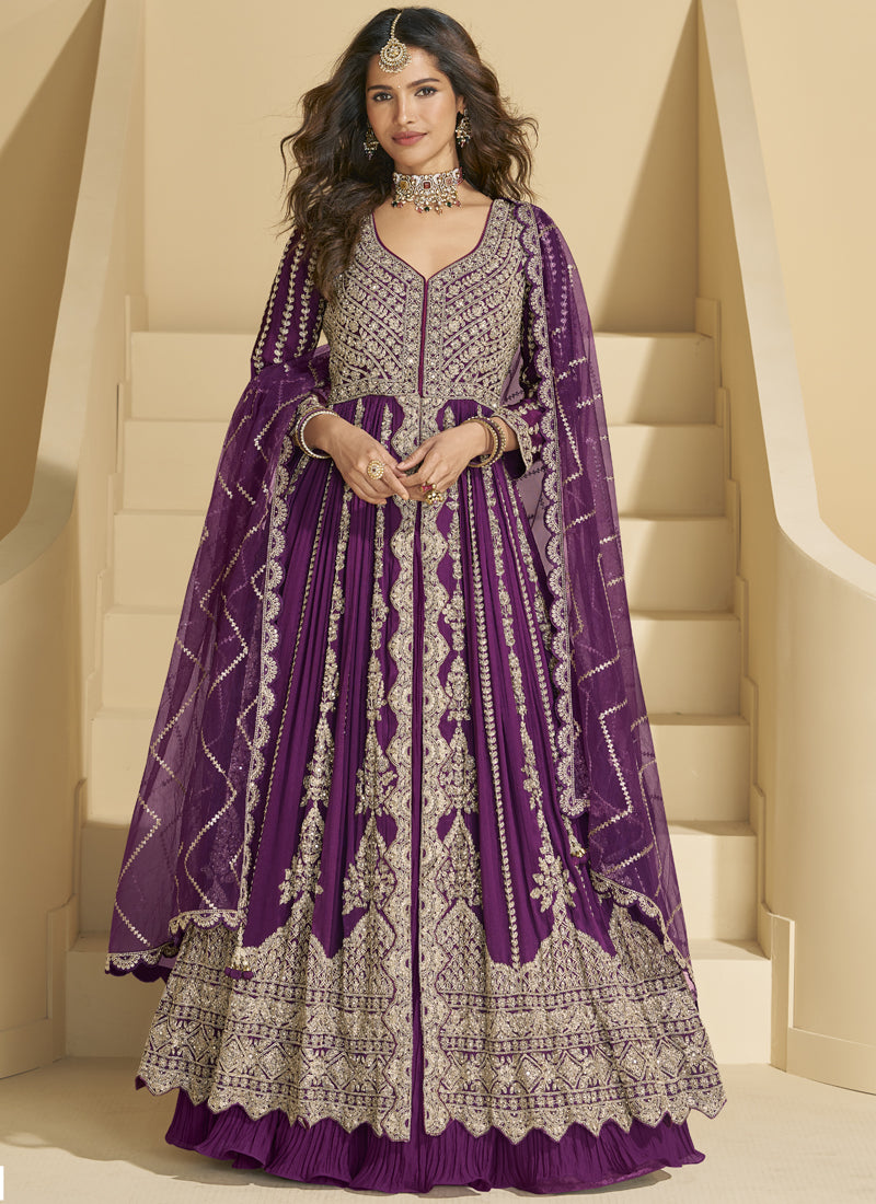 Front view of a purple chinon silk lehenga style suit with intricate gota patti embroidery