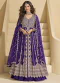 Violet and gold embroidered chinon silk lehenga style suit with traditional festive aesthetic.