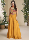 Mustard Chinon silk palazzo suit featuring intricate embroidery and gota patti work